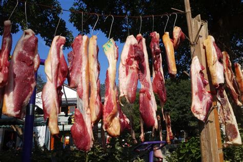 drying meat outdoors.